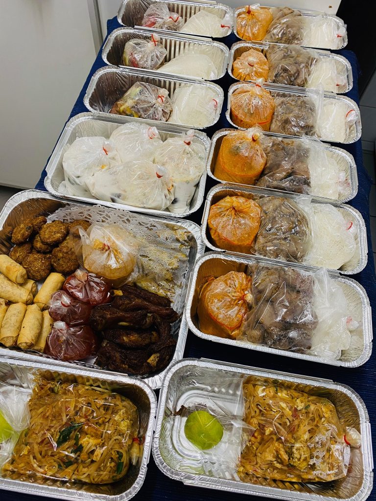 Thai food prepared for takeout
